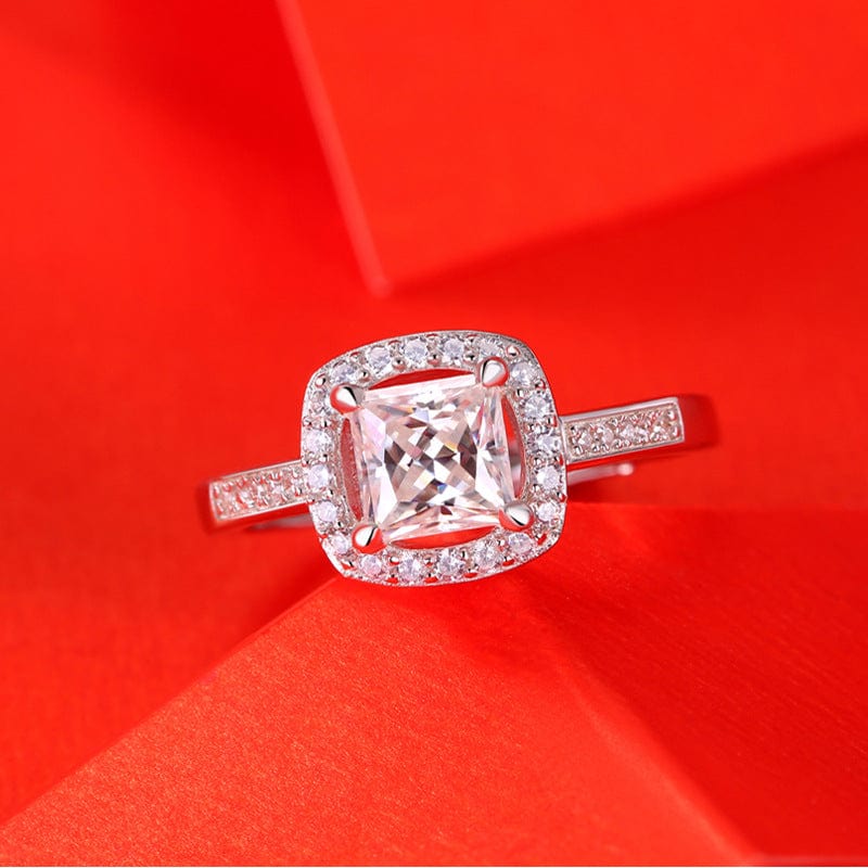 1ct Moissanite Square Framed Adjustable Engagement Ring in 925 Sterling Silver top view on a red background