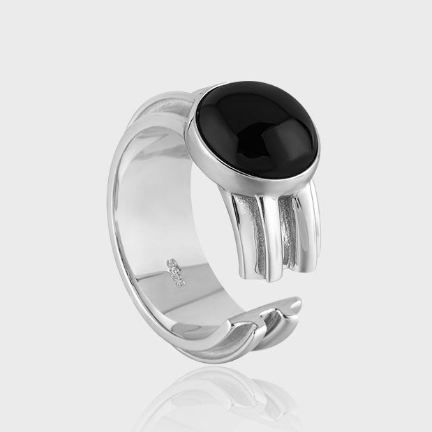 Image of the side of the Black Agate Unisex Adjustable Ring in 925 Sterling Silver in a light gray background 